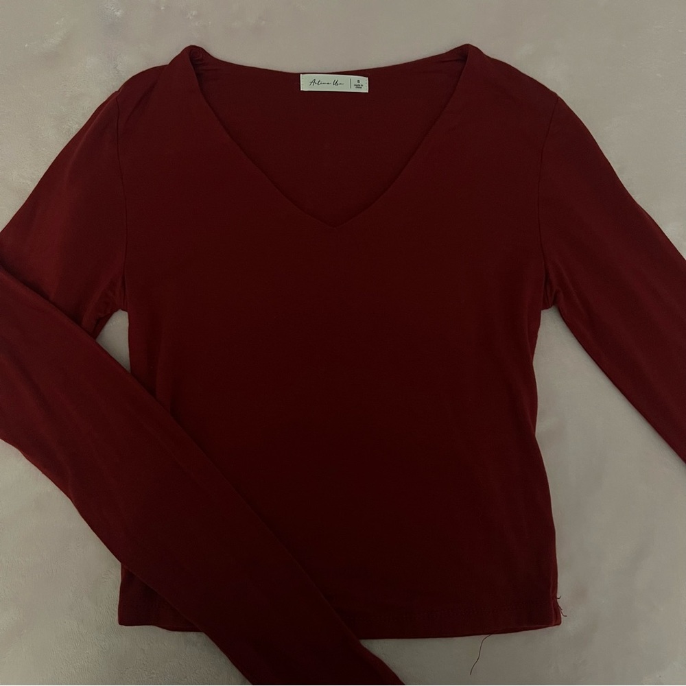 burgundy long sleeve v neck.
